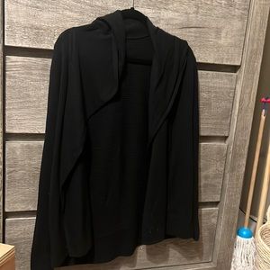 Black lululemon cardigan. Can be worn with a hood or not.